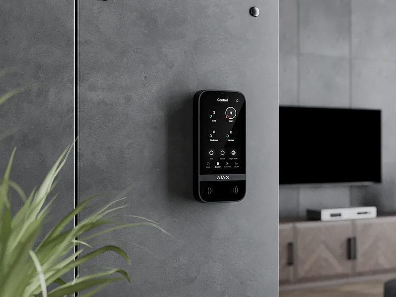 Ajax KeyPad TouchScreen mounted in a villa living area