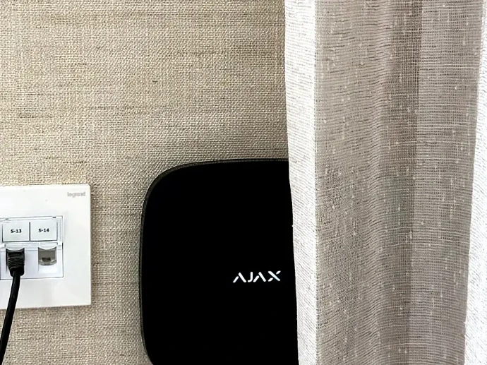 Ajax hub installed on a villa wall in Dubai by The Key Trade